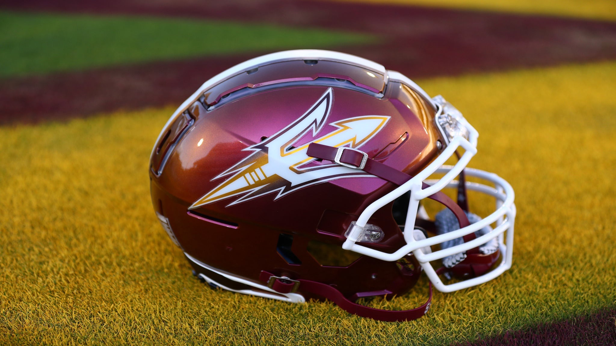 image of an ASU football helmet with the pitchfork on it.