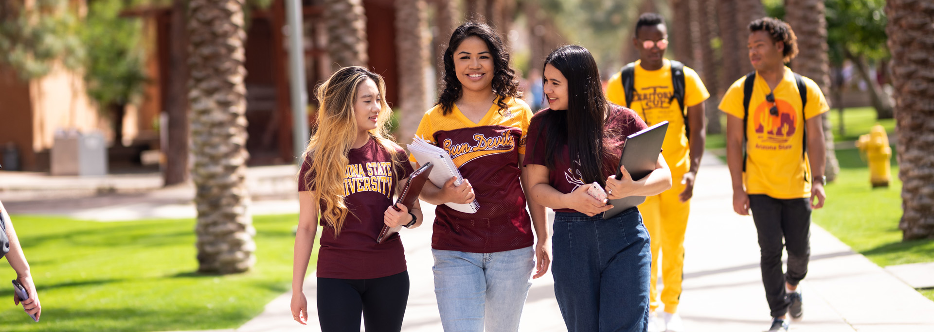 Eoss Hero Image, Students walking around campus