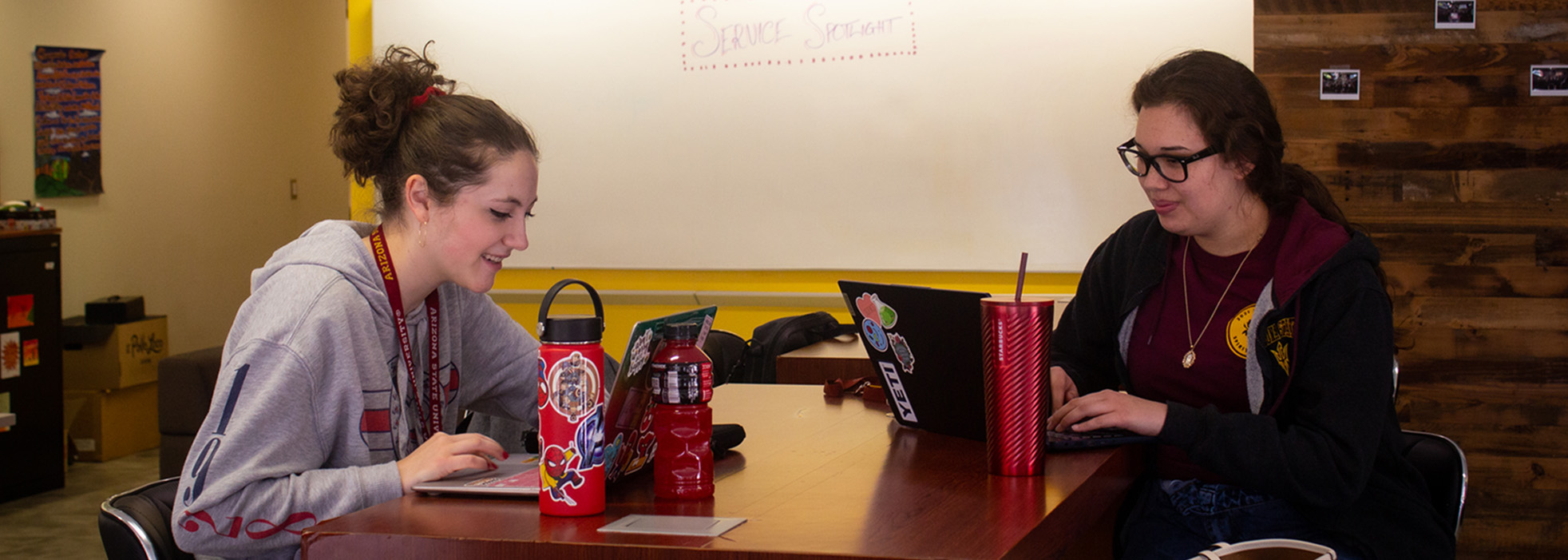 Two students study at ASU West