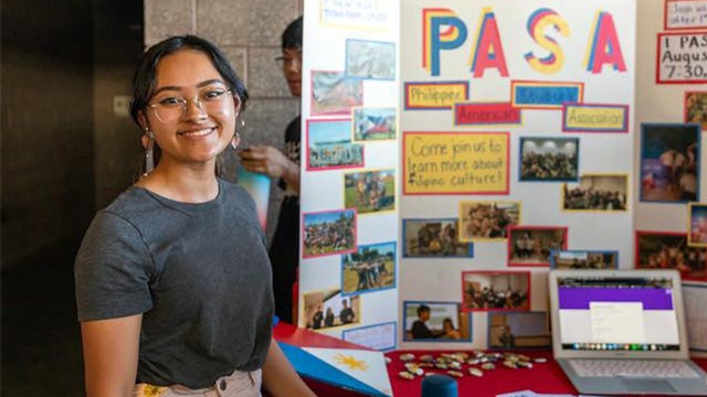 A student in ASU's PASA club tables at CultureFest