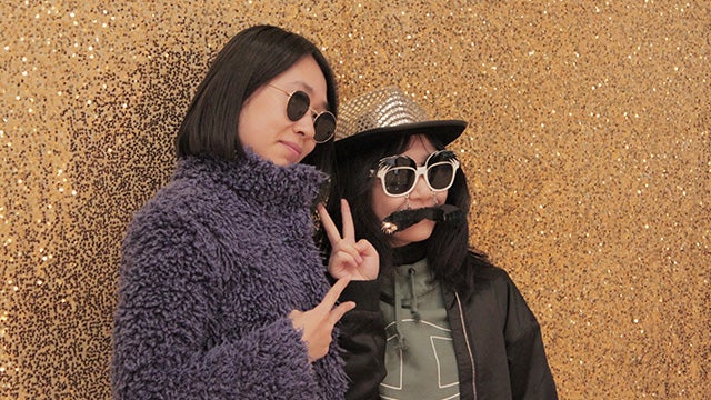 ASU international students pose in a photobooth for the 2019 orientation carnival