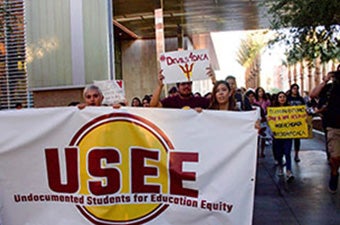 Members of Undocumented Students for Education Equality marching through ASU’s Tempe campus