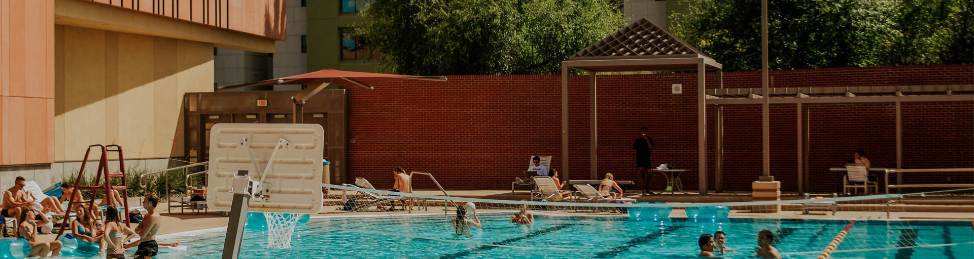 Students enjoying the pool