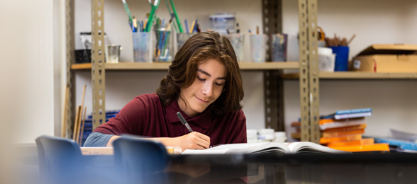 Introduction to Journaling Teaser, student at his desk